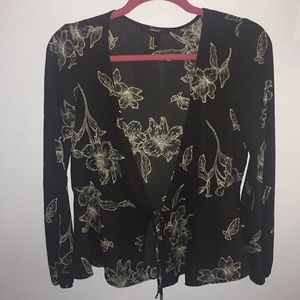 White and black floral blouse